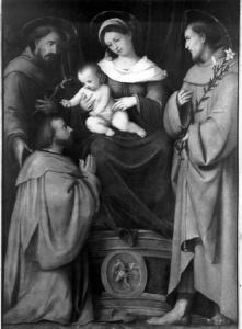 La Madonna in trono col Bambino, i Santi Francesco e Antonio da Padova e un donatore