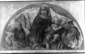 La Madonna col Bambino, un santo martire e un santo francescano