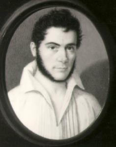 Ritratto di giovane uomo con corta barba nera