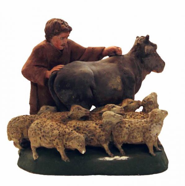 Pastore con toro e pecore