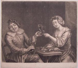 Uomo e donna brindano seduti ad un tavolo